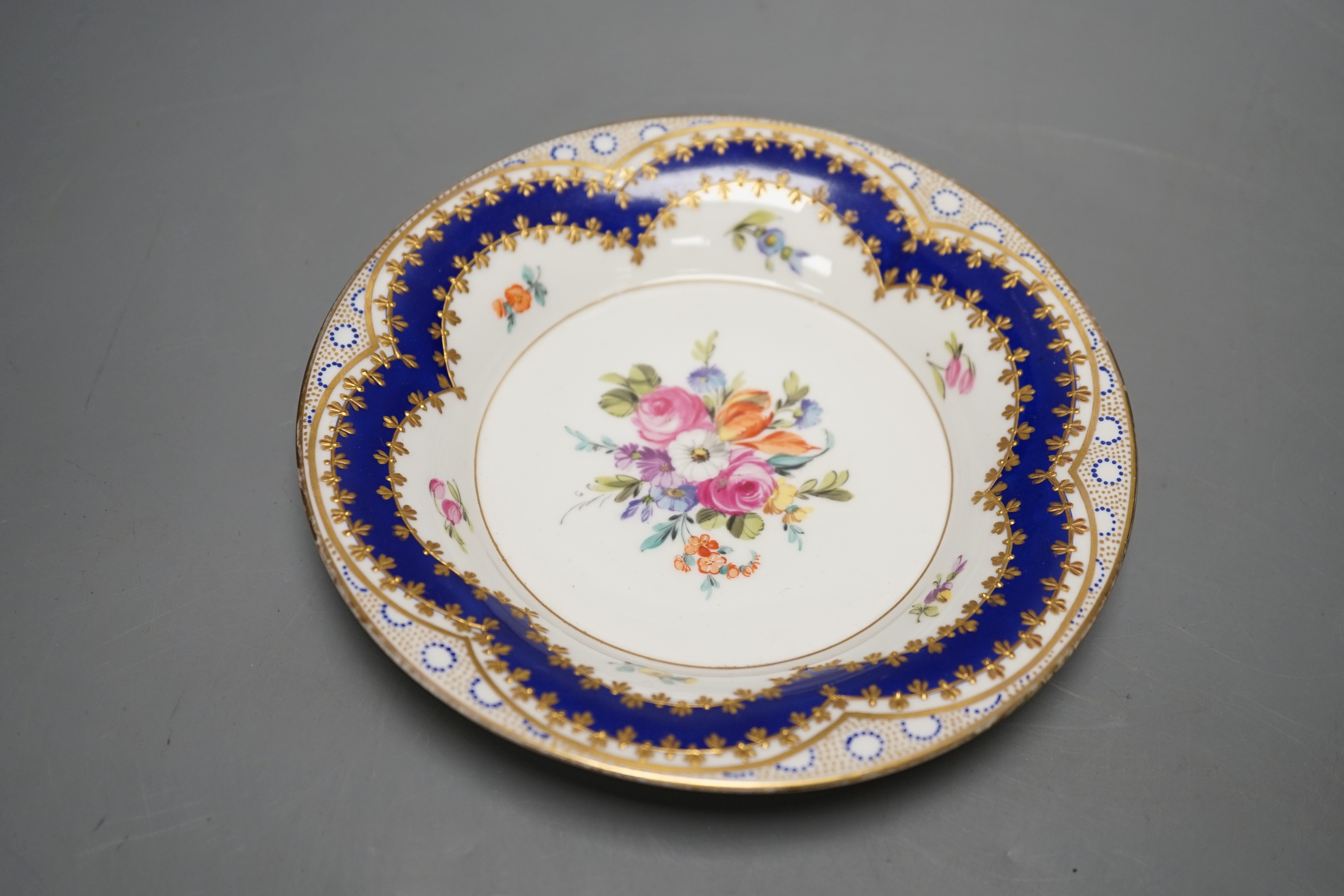 A late 19th century Royal Worcester cup and a Sevres style cup and saucer, diameter 16cm